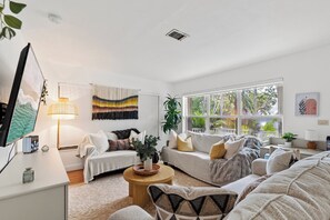 * Movie-Ready Vibes – Kick back with your crew on plush couches and stream your favorites on the Smart TV in this chic, bohemian-style lounge.