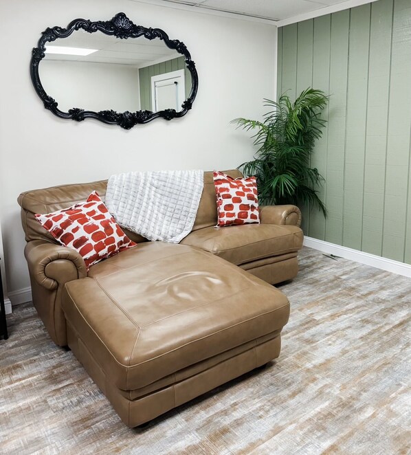 Power recliner with chase lounge