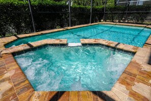 Pool area showing spa and jacuzzi jets working.