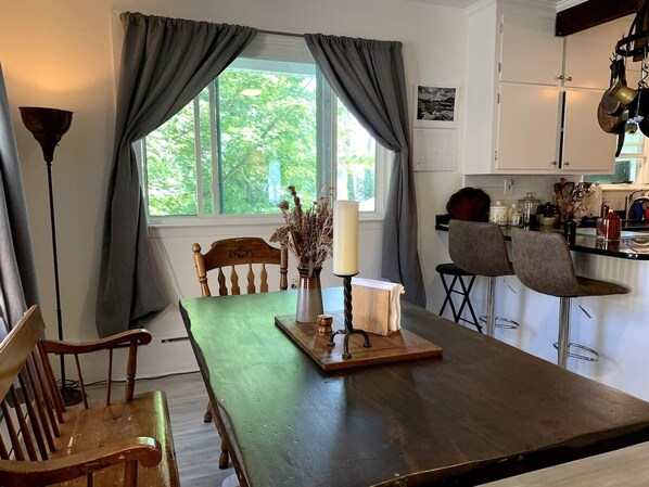 Kitchen table overlooking the treetops. 