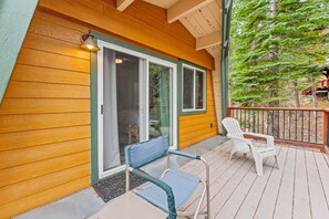 Exterior: Upper-level deck, 2 chairs, serene forest views
