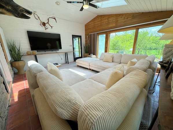 The sun room! A perfect area to watch games or movies as a group!