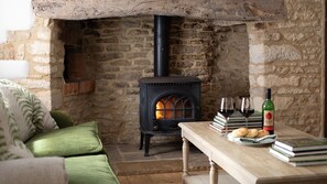Sit beside the warming fire with a glass of wine at the end of the day