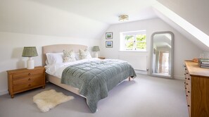 Bedroom one wraps you in tranquility