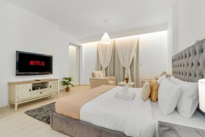 Bedroom | Bed | Towels | TV