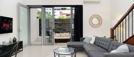Netflix smart TV and spacious lounge area