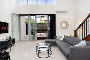 Netflix smart TV and spacious lounge area