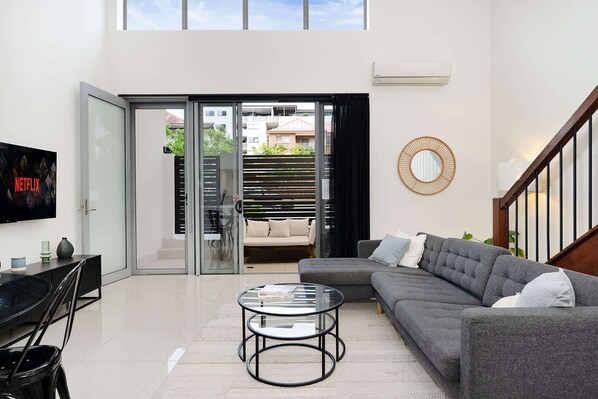Netflix smart TV and spacious lounge area
