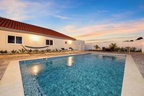 Where the day ends in perfect serenity. Evening vibes by the pool.