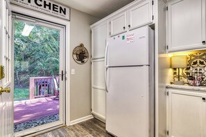 Smoky Mountain Vacation Rental "Sparkling Waters" - Kitchen and back door