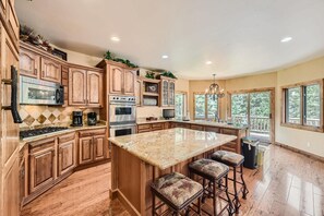 Sip morning coffee or grab a bite at the kitchen counter