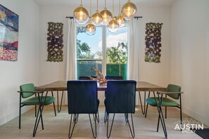 Gather around the comfortable and inviting dining table
