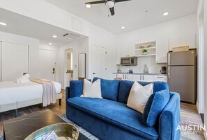 Luxurious full sized sleeper sofa with extra bedding