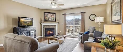Spacious Living Room with Gas Fireplace, Sleeper Sofa and SMART TV with Cable & WIFI throughout vacation rental