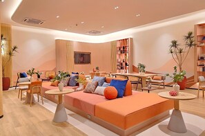 A spacious and feature-filled living room, this area can cater to your various needs, whether you want to work, relax, or play.