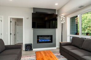 Home Theatre: 75" Samsung 4K Smart TV & Dolby Surround Sound System