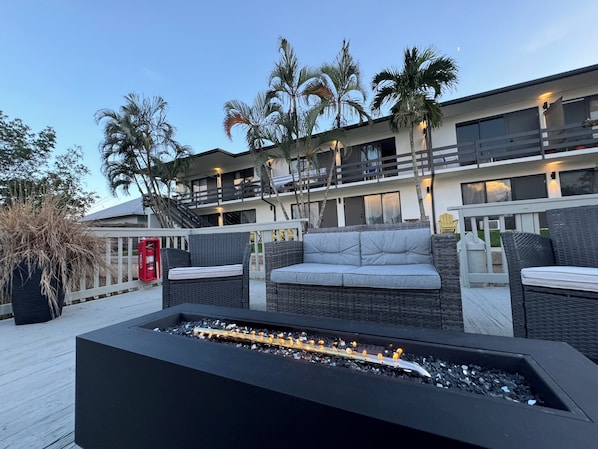 Outside Private Dock Seating Area With Fireplace