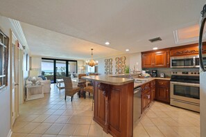 View of the kitchen, dining area and living room with gulf views