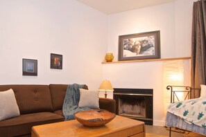 Showing the living area with Sofa, Daybed. Access deck off living room