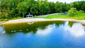 Spend a perfect day at the nearby community beach, complete with calm waters, a charming gazebo, and playground for family fun and relaxation.