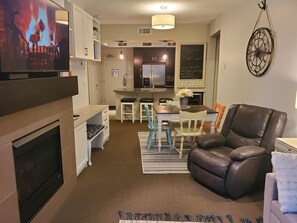 A view from the living room of the dining room and kitchen