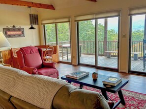 Great room with sliding glass doors onto the porch and deck.