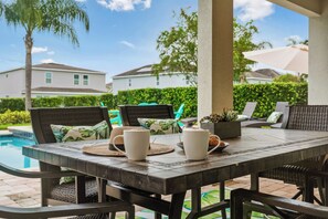 Coffee by the Pool: Start your day with a relaxing coffee beside the pool.