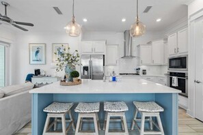 Seating for 4 at the kitchen island - grab a drink or two!