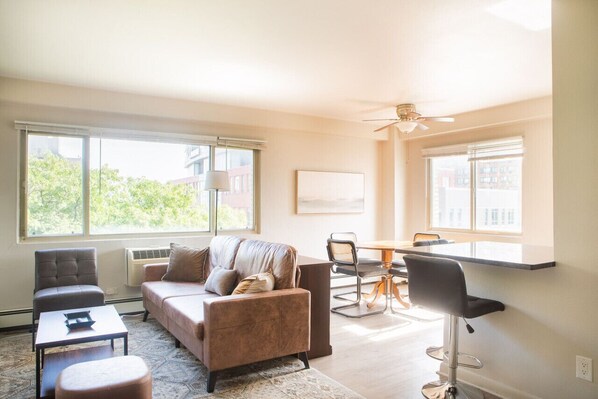 Spacious living room with dedicated workspace