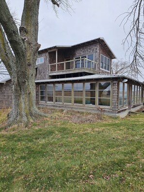 Enjoy the second floor deck, large sunroof, and one-acre rural property. 