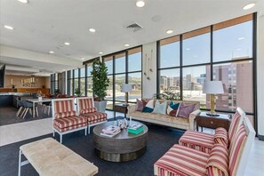 Community lounge area next to the pool
