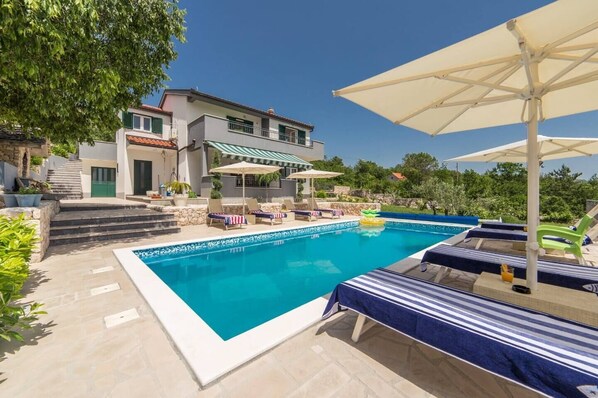 The attraction of the heated pool invites you to refresh yourself