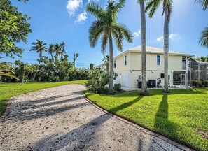 Shell driveway leading to house
