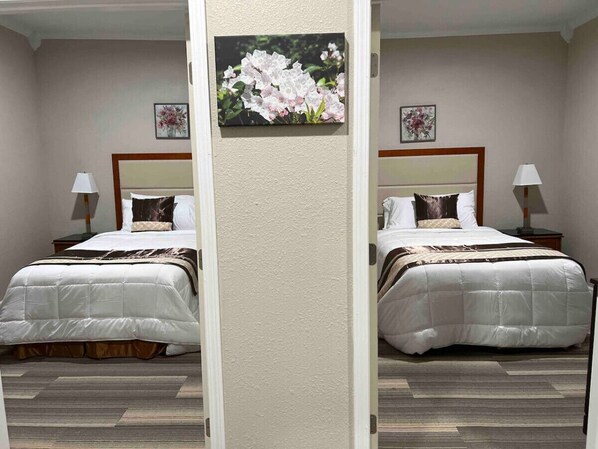 Two private rooms with a double bed in each room