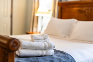 Fresh towels and a comfy bed! Your perfect spot to unwind and relax.
