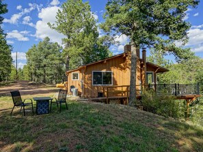 From warming up around the firepit, to grilling up your favorites to dozing off in the hammock, this peaceful outdoor space is your perfect spot to unwind and reconnect with nature.