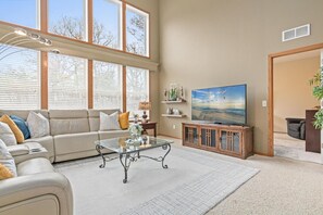 Minne-Getaway: Timber Ridge features a majestic 2 story great room with a main floor bedroom.