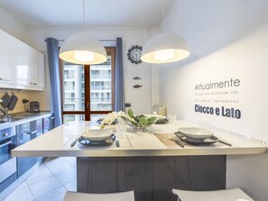 Cabinetry, Property, Furniture, Table, Countertop, Sink, Tap, Kitchen, Interior Design, Chair