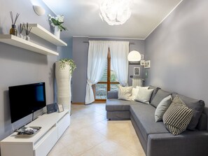 Furniture, Property, Couch, Interior Design, Comfort, Floor, Lamp, Living Room, Ceiling