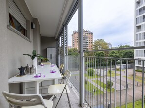Building, Plant, Sky, Houseplant, Table, Window, Cloud, Condominium, Floor