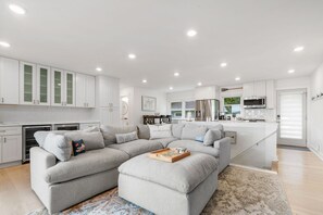 Enjoy the views from this beautifully lit living room