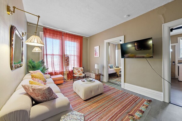 Unwind in the boho chic living room & stream your favorites on the smart TV