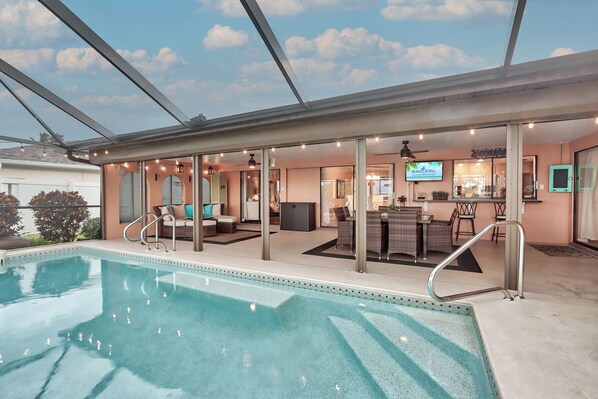 Outdoor area with private heated pool