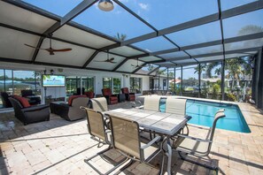 Private heated pool with outdoor dining table & seating