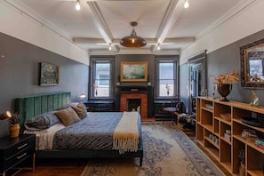 Bedroom two exudes style and comfort with a luxuriously large Queen bed and Twin bed