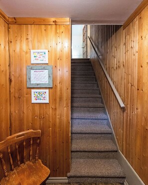 When you open the front door, you need to climb one set of stairs from the porch