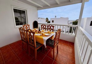 Covered balcony with partial seaview and BBQ