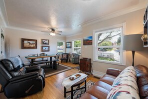 Plenty of comfy seating for dining, visiting, and playing records and games!
