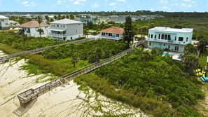 This private boardwalk takes you right down to the beach, you're directly on the water!