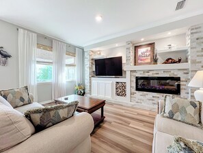 Beautiful stone wall with fireplace to soothe your worries  away!